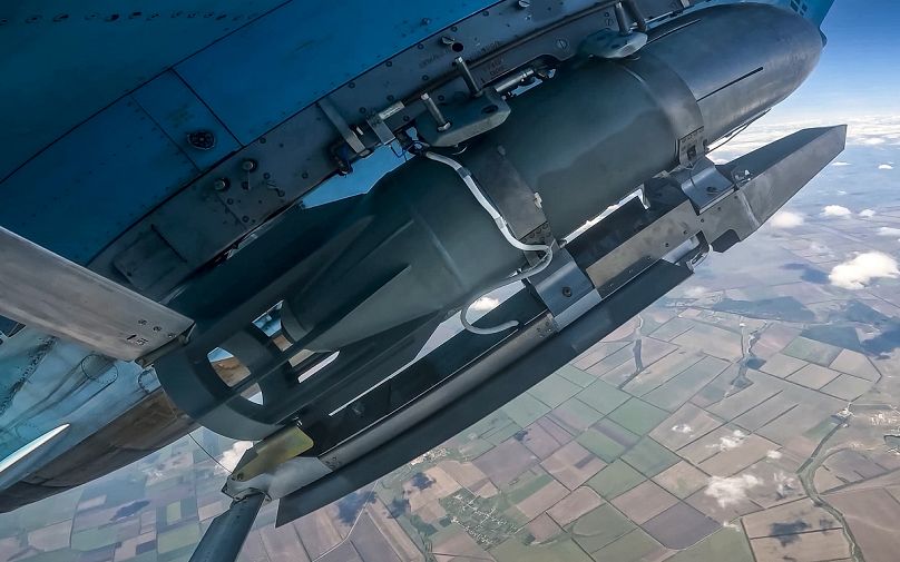 A glide bomb is seen under the wing of a Su-34 bomber of the Russian air force during a combat mission in Ukraine
