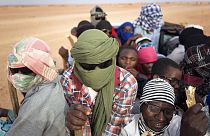 Мигранты едут в переполненном пикапе в Ливию из нигерийского Агадеса, июнь 2018 г. 