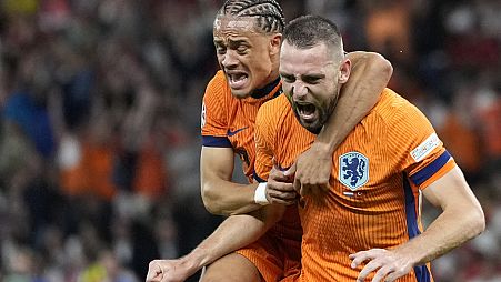 Netherlands' De Vrij celebrates scoring the equaliser against Turkey