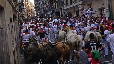 The first day of the running of the bulls at the San Fermín fiestas in Pamplona, Spain, Sunday, July 7, 2024.