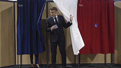 French President Emmanuel Macron and his wife Brigitte Macron vote on Sunday July 7th 2024.