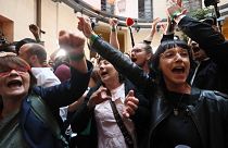Supporters of the far-left La France Insoumise (France Unbowed) party react at the election night headquarters.