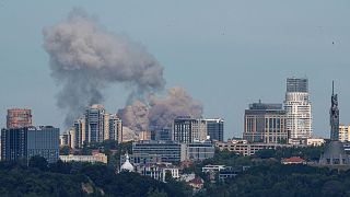 Smoke rises over the Kyiv skyline after a Russian attack.