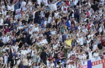 England fans celebrate after winning a quarterfinal match between England and Switzerland at the Euro 2024 soccer tournament in Duesseldorf, Germany, Saturday, July 6, 2024. 