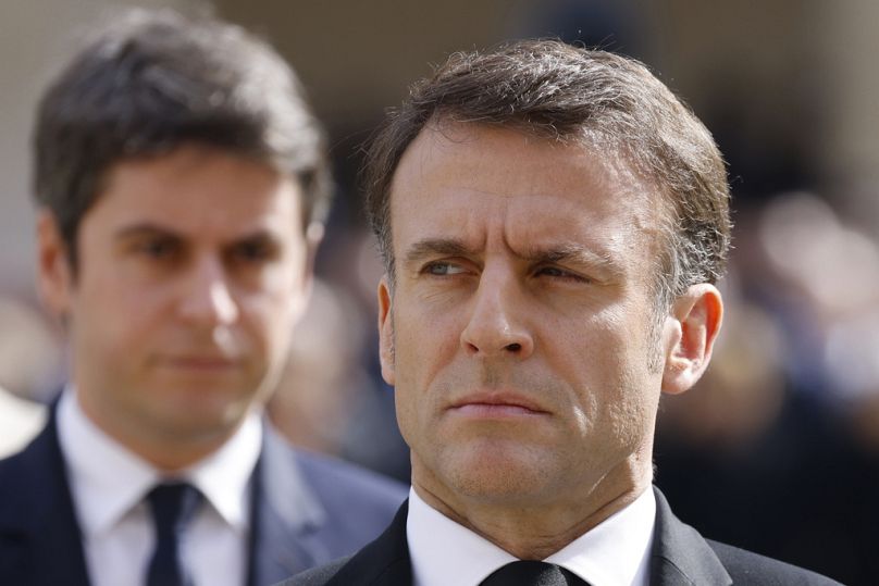 French Prime Minister Gabriel Attal and President Emmanuel Macron attend a ceremony in Paris, 20 March 2024
