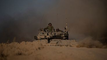 Israeli soldiers in a tank near the Israeli-Gaza border. Israeli soldiers in a tank near the Israeli-Gaza border.