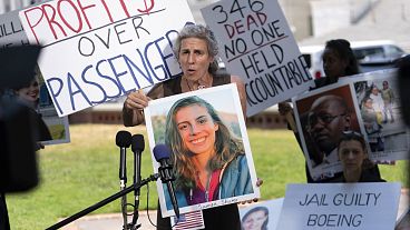 Nadia Milleron, the mother of Samya Rose Stumo, who died in the Ethiopia crash, holds a picture of her daughter at a protest in June Nadia Milleron, the mother of Samya Rose Stumo, who died in the Ethiopia crash, holds a picture of her daughter at a protest in June
