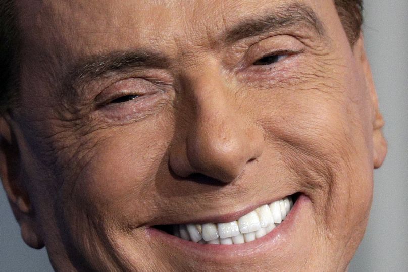 Italian former Premier and Forza Italia party leader, Silvio Berlusconi, smiles during the recording of a TV talk show in Rome in 2018