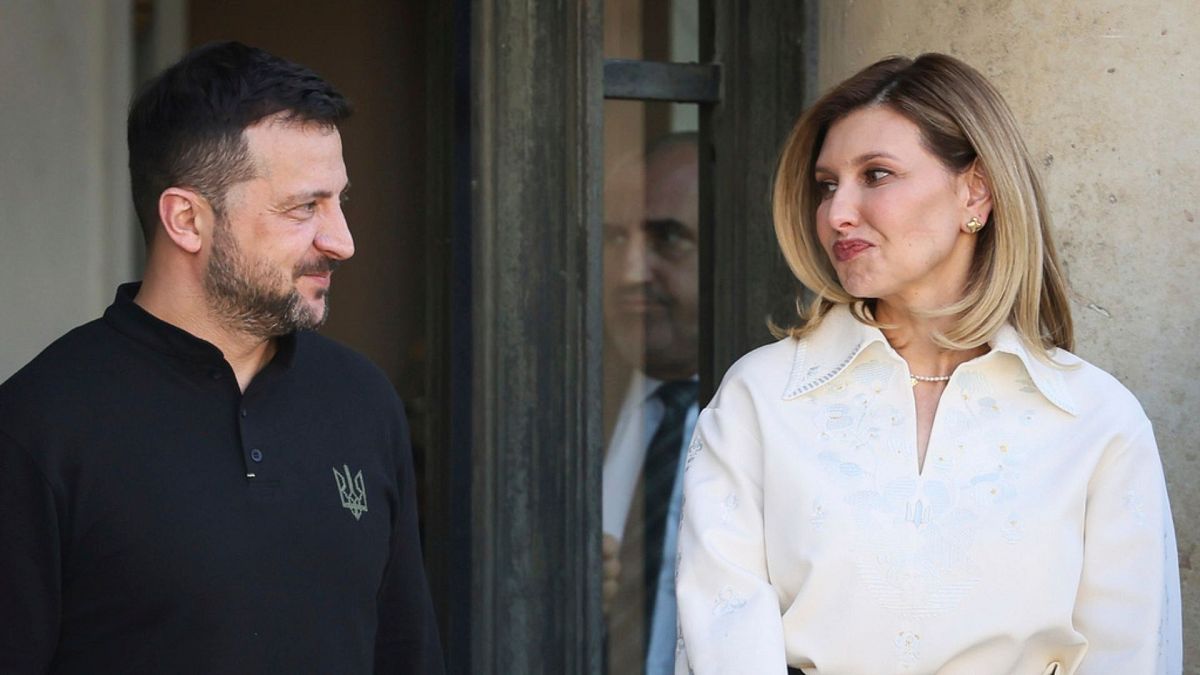 Ukrainian President Volodymyr Zelenskyy and his wife Olena Zelenska look at each other Friday, June 7, 2024 at the Elysee Palace in Paris.