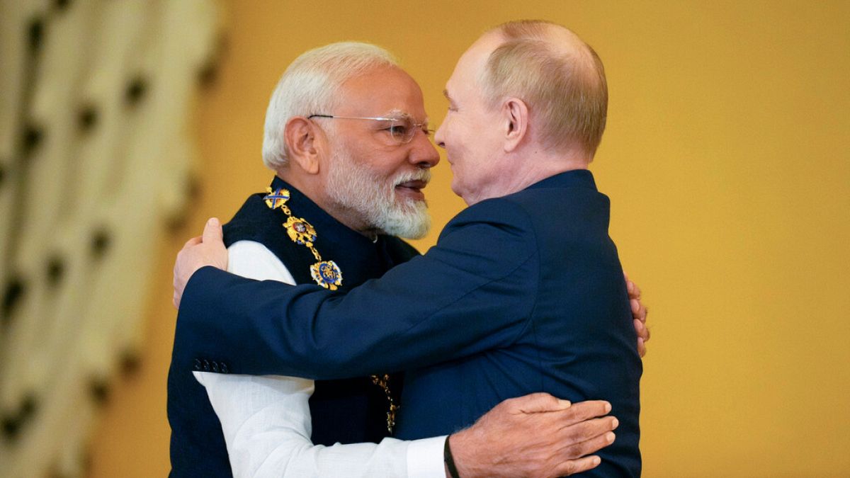 Russian President Vladimir Putin, right, awards Indian Prime Minister Narendra Modi, in Moscow, Russia, Tuesday, July 9, 2024.