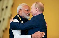 Russian President Vladimir Putin, right, awards Indian Prime Minister Narendra Modi, in Moscow, Russia, Tuesday, July 9, 2024.