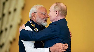 Russian President Vladimir Putin, right, awards Indian Prime Minister Narendra Modi, in Moscow, Russia, Tuesday, July 9, 2024.