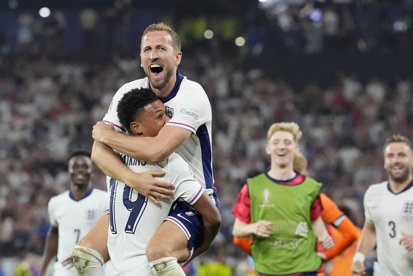 England's Kane and Watkins celebrate after the 2-1 on the Netherlands