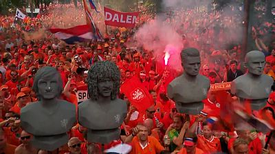 Dutch fans march through Dortmund