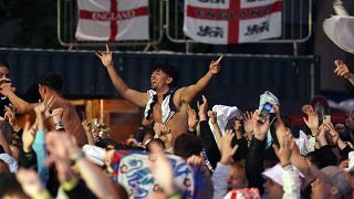 England fans celebrate at Euro 2024 screening at Central Park in Newcastle, England.