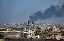 Smoke rises following an Israeli airstrike in the central Gaza Strip.