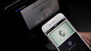 Apple Pay is demonstrated after its launch. 