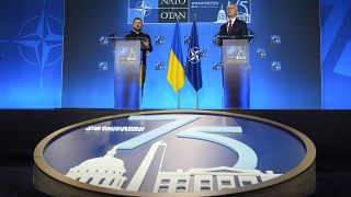 Ukraine's President Volodymyr Zelenskyy and NATO Secretary General Jens Stoltenberg speak during a press conference at the NATO summit in Washington, Thursday, July 11, 2024.
