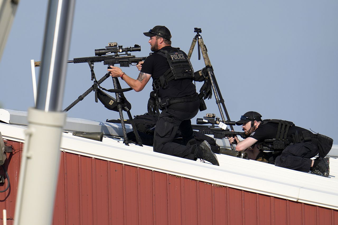 Police snipers return fire after shots