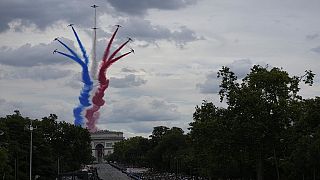 France's Bastille Day parade meets the Olympic torch relay
