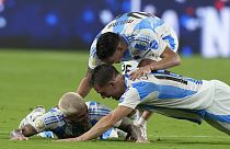 Argentina players celebrate after defeating Colombia in the final of the Copa America football tournament in Miami Gardens, Florida, Monday, July 15, 2024. 