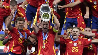 Spanish national team celebrate after winning the final match between Spain and England at the Euro 2024 tournament in Berlin.