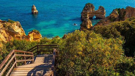 Hike to hidden coves in Lagos, Portugal.
