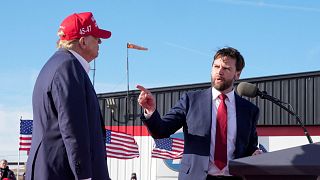  Sen. J.D. Vance, R-Ohio, right, points toward Republican presidential candidate former President Donald Trump at a campaign rally, March 16, 2024, in Vandalia, Ohio.