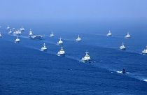 Közös kínai-orosz haditengerészeti hadgyakorlat kezdete a kínai Zhanjiang kikötőjében 2024. július 14-én