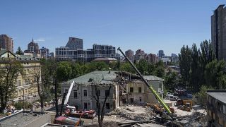 Rescue workers clear the rubble at the site of Okhmatdyt Children's Hospital hit by Russian missiles in Kyiv, Ukraine.