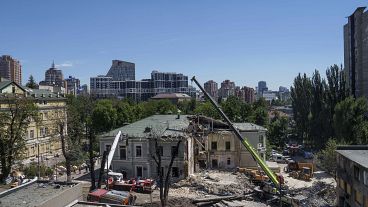 Rescue workers clear the rubble at the site of Okhmatdyt Children's Hospital hit by Russian missiles in Kyiv, Ukraine. Rescue workers clear the rubble at the site of Okhmatdyt Children's Hospital hit by Russian missiles in Kyiv, Ukraine.