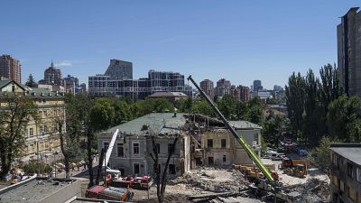 Rescue workers clear the rubble at the site of Okhmatdyt Children's Hospital hit by Russian missiles in Kyiv, Ukraine.