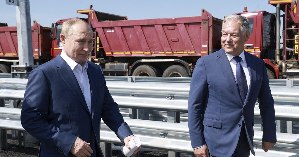 Putin drives a new Russian Lada sedan on just opened final segment of ...