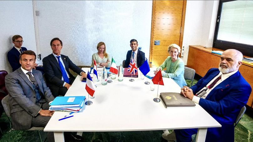 The leaders of France, the Netherlands, Italy, the UK, the European Commission and Albania talk migration on the sidelines of the EPC summiit in Granada, Spain, Oct. 5, 2023.