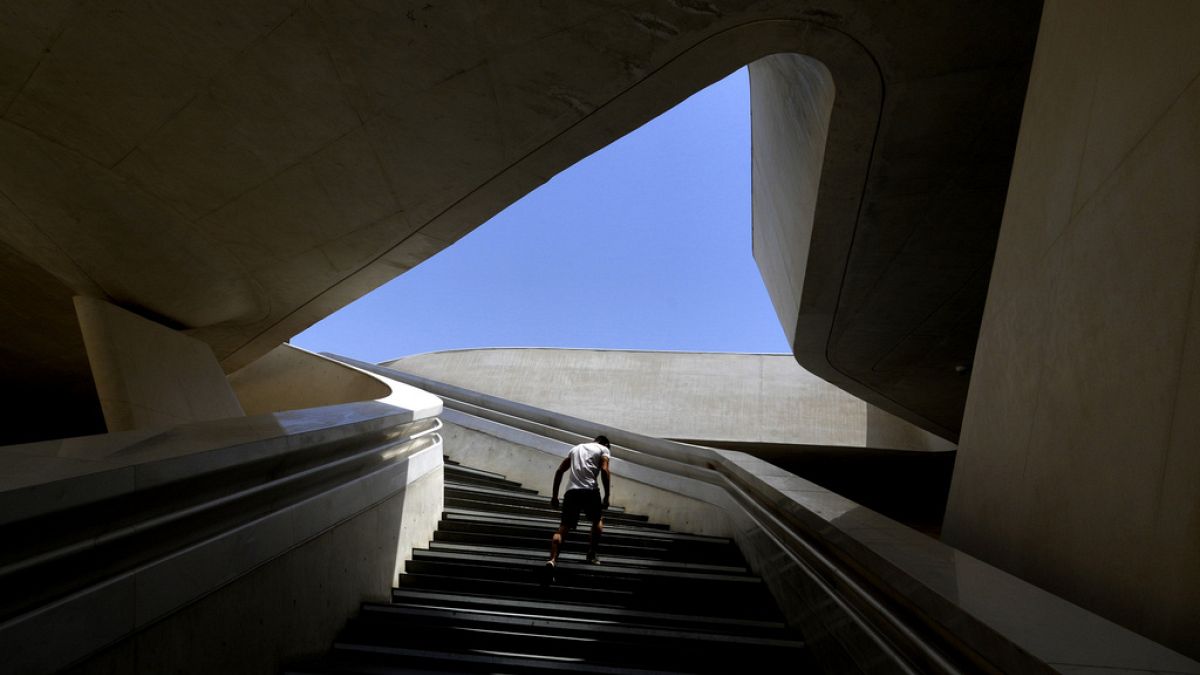 A man walks up the steps at Eleftheria, Liberty, square in central of capital Nicosia, Cyprus, Friday, May 17, 2024