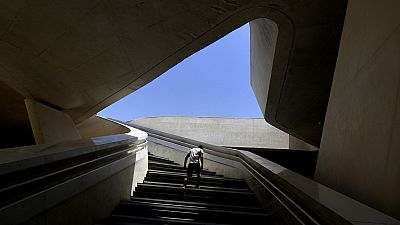 A man walks up the steps at Eleftheria, Liberty, square in central of capital Nicosia, Cyprus, Friday, May 17, 2024