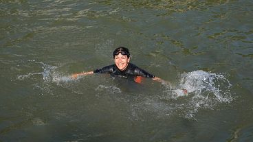 Paris Mayor Anne Hidalgo swims in the Seine.