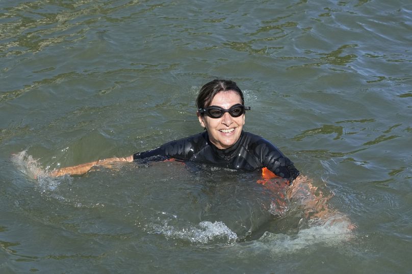 Paris Mayor Anne Hidalgo swims in the Seine river Wednesday, July 17, 2024 in Paris.