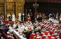 King Charles III reads the King's Speech, with Queen Camilla sitting beside him during the State Opening of Parliament in the House of Lords, London,.