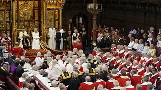 King Charles III reads the King's Speech, with Queen Camilla sitting beside him during the State Opening of Parliament in the House of Lords, London,.