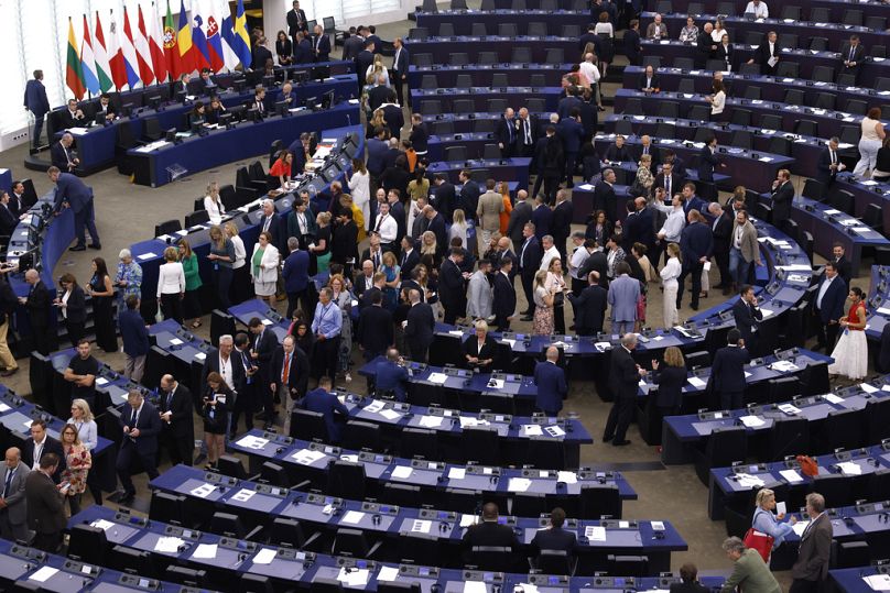 Members of European Parliament enter the plenary chamber as they prepare to vote at the European Parliament in Strasbourg, 18 July 2024