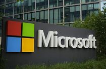 The logo of Microsoft is seen outside it's French headquarters in Issy-les-Moulineaux, outside Paris, Monday, May 13, 2024. (AP Photo/Thibault Camus)