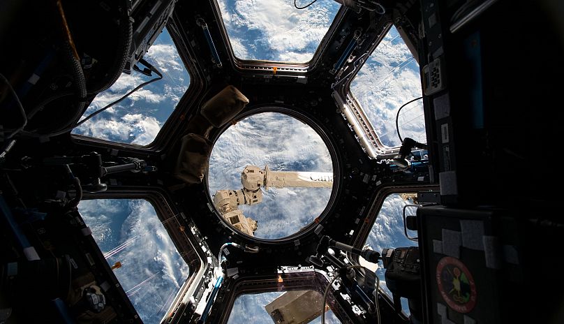 A view of Earth from the Cupola, a 360 degree observation area and remote control location for grappling, docking and undocking spacecraft on the International Space Station.