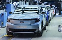 Ford Explorer electric cars stand in the hall at the start of production, in Cologne, Germany, Tuesday June 4, 2024. 