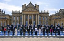 Britain's Prime Minister Keir Starmer, front center, poses for a family photo with Europe's leaders during the European Political Community Summit at Blenheim Palace.