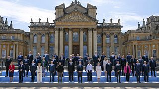 Britain's Prime Minister Keir Starmer, front center, poses for a family photo with Europe's leaders during the European Political Community Summit at Blenheim Palace.