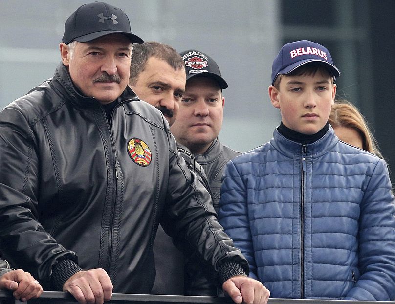 Belarus President Alexander Lukashenko, left, with his sons Viktor, second from left, Dmitry, third from left, and Nikolai