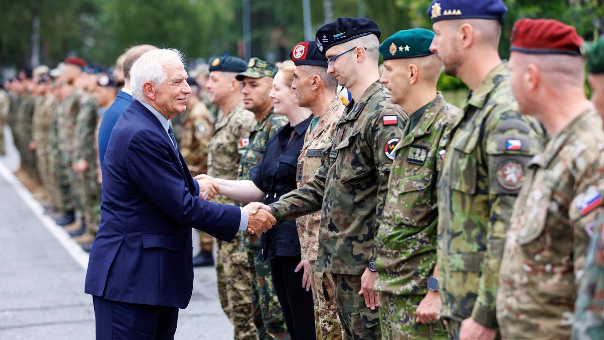 Josep Borrell meeting troops at Latvia's Camp Ādaži Military Base near Rīga.