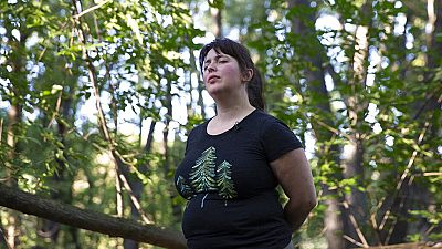 Leigha Horton of Silvae Spiritus closes her eyes as she invites participants to ground themselves and focus on their sense of hearing Monday, Sept. 23, 2019