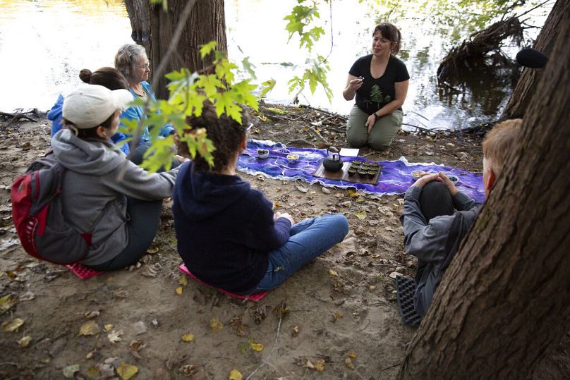 Leigha Horton of Silvae Spiritus ends the guided nature and forest therapy walk with a tea ceremony Monday, Sept. 23, 2019